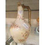 A Royal Worcester gilt handled jug (A/F)