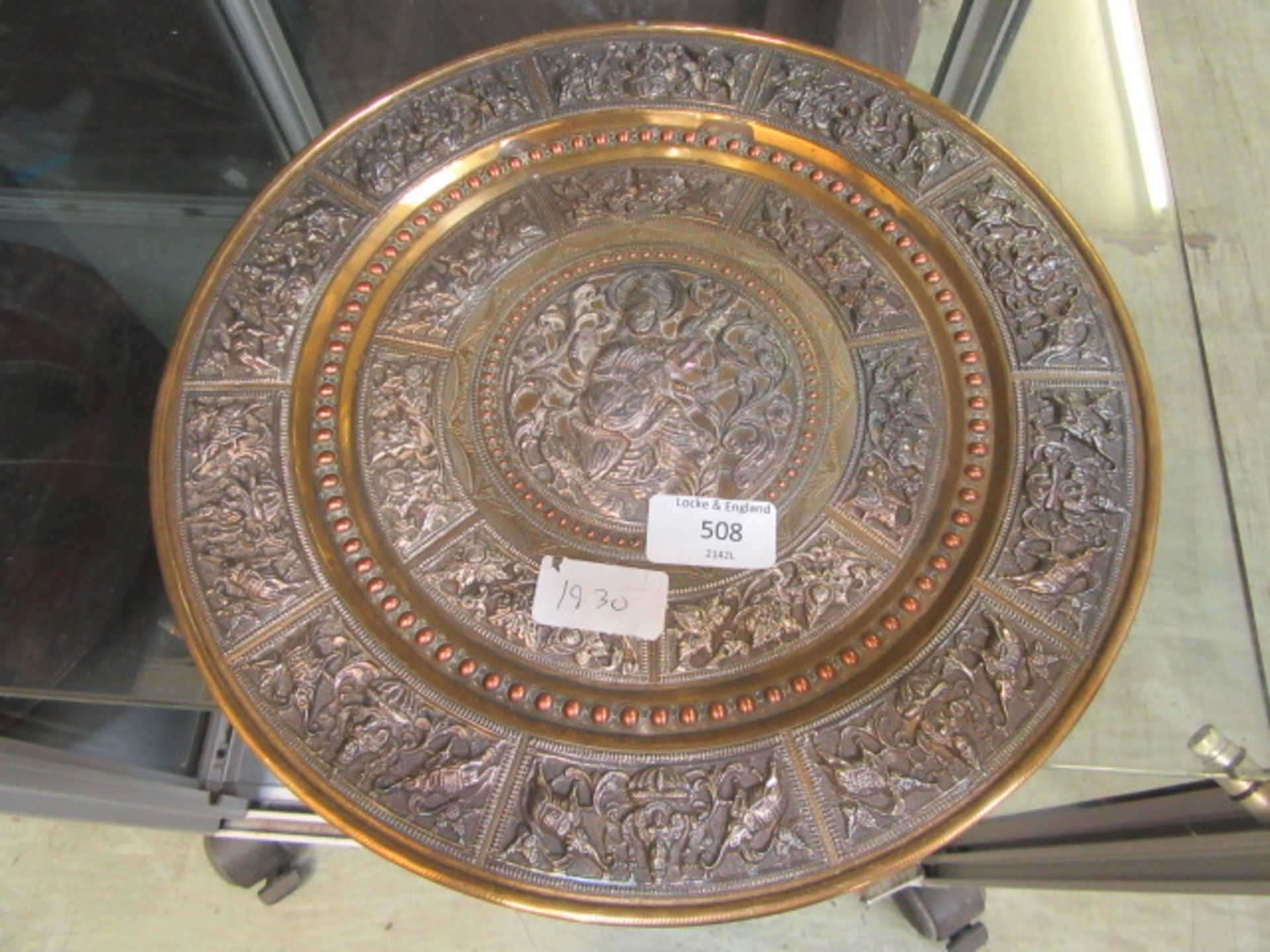 An eastern brass and silver plaque