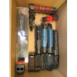 A box containing an assortment of 00 railway locomotives and carriages