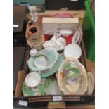 A tray of assorted ceramic and glassware to include decanter, cups, saucers,