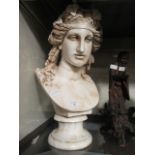 A moulded marble effect bust of lady