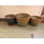 A selection of glazed garden pots