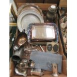 A tray containing an assortment of plated ware, pewter ware,