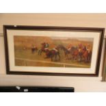A framed and glazed racing print