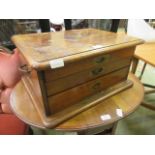 A Victorian walnut three drawer canteen