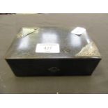 An ebony storage box having silver hallmarked mounts