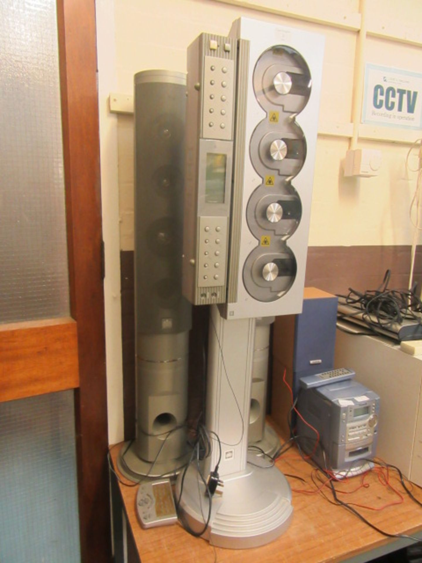 A Ministry Of Sound multi CD player along with speakers and remote