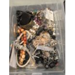 A carton of assorted costume jewellery