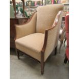 An Edwardian mahogany inlaid chair