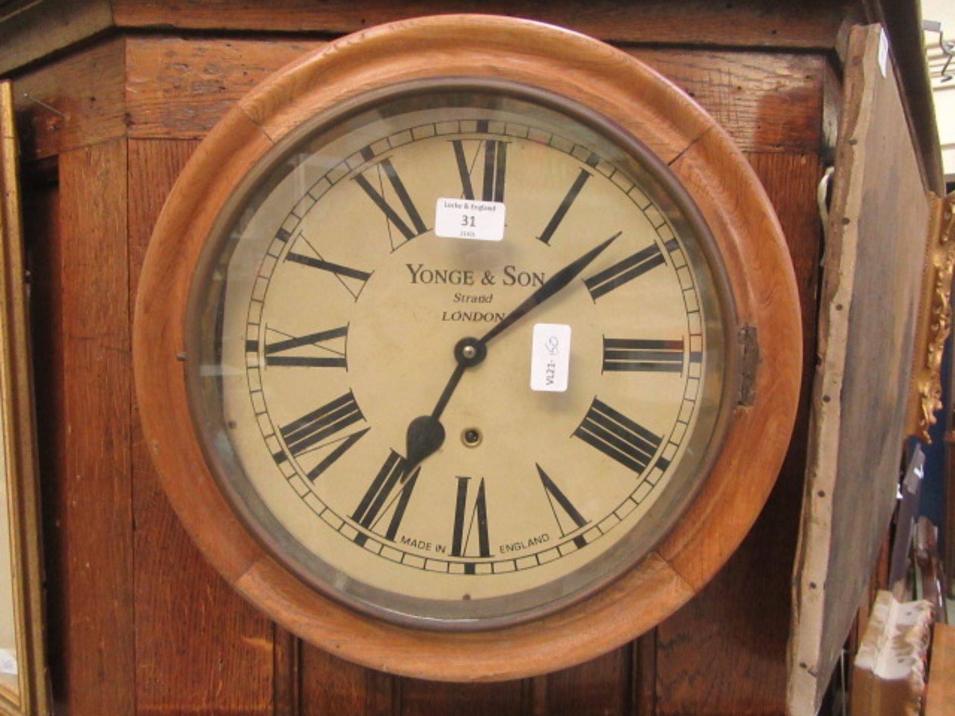 A 19th century oak wall clock by Yonge and sons of London