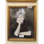 A framed and glazed photographic print of princess Diana