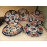 A collection of eastern style Imari style plates