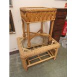 Two wicker occasional tables with glass tops
