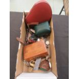 A box containing an assortment of collectibles to include beads, whistle, watches,