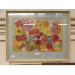 A framed and glazed painting of flowers