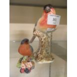 A Royal Worcester model of bird together with a Royal Worcester model of blue bird