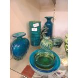 A selection of mid-20th century coloured glassware to include bowls, vases,