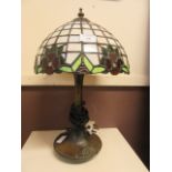 A reproduction Tiffany style table lamp