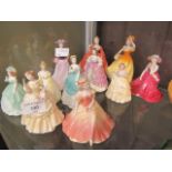 A collection of ten Coalport figurines of young ladies,