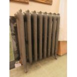 A 19th century cast iron ornate radiator (A/F)