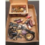 A collection of coinage, beads,