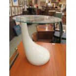 A mid-20th century design white Perspex occasional table with a circular glass top