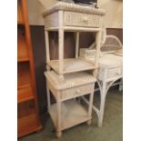 A pair of white painted wicker bedside cabinets