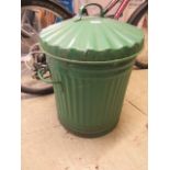 A green painted dustbin