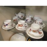 A six piece Royal Worcester Evesham tea set comprising of cups, saucers, plates, cream jugs,