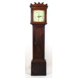 An 18th century oak long case clock, the enameled face with Roman numerals,