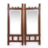 A pair of Edwardian trampwork mirrors, h. 79 cm, w.