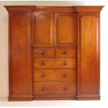 A 19th century mahogany reverse break front wardrobe,