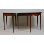 A late 18th century mahogany and strung D-end dining table,