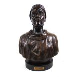 An early 20th century bronze bust of an Eastern gentleman on ebonized plinth with presentation