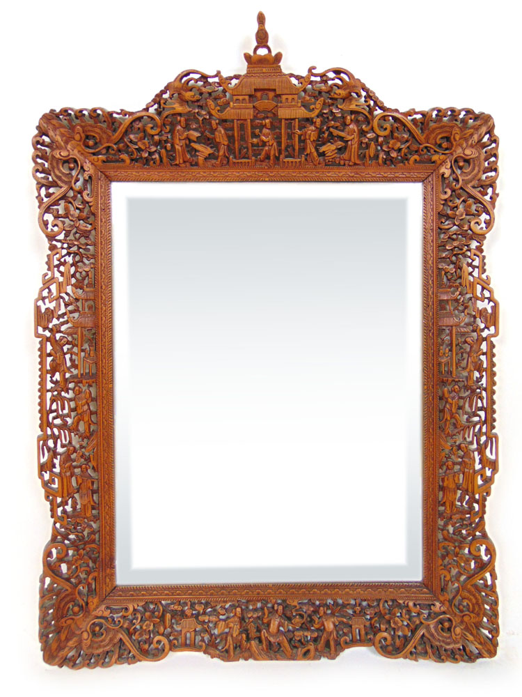 An early 20th century Chinese carved frame bevel glass mirror h.75 cm, w.