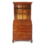 An 18th century oak bureau bookcase,