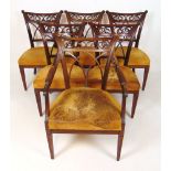 A set of six (5+1) 19th century French mahogany dining chairs upholstered in yellow suede,