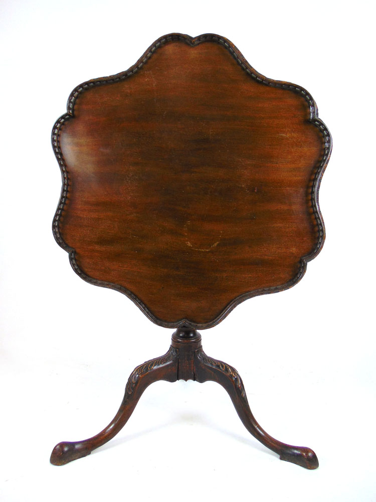 A 19th century possibly Irish mahogany tripod table in the 18th century style,