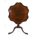 A 19th century possibly Irish mahogany tripod table in the 18th century style,