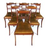 A set of six early 19th century rosewood dining chairs,