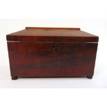 A Regency mahogany and boxwood strung sarcophagus tea caddy,