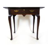 An 18th century oak single drawer side table on cabriole legs, h. 74 cm, w. 85 cm, d.