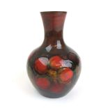 A Moorcroft Flambe Clematis pattern vase bearing Queen Mary label to base, h.