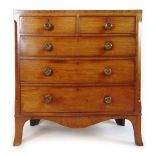 A late 18th century mahogany and boxwood strung chest of two short over three long drawers,