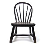 A 19th century ash and elm child's Windsor chair, h. 49 cm, w. 29 cm, d.