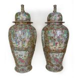 A pair of large Chinese early 20th century famille rose lidded vases,