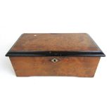 A 19th century burr walnut cased cylinder music box bearing Paillard Vaucher Fils label under lid,