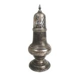 A Victorian silver sugar castor of conventional form.