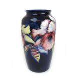 A William Moorcroft Orchid pattern vase, h.