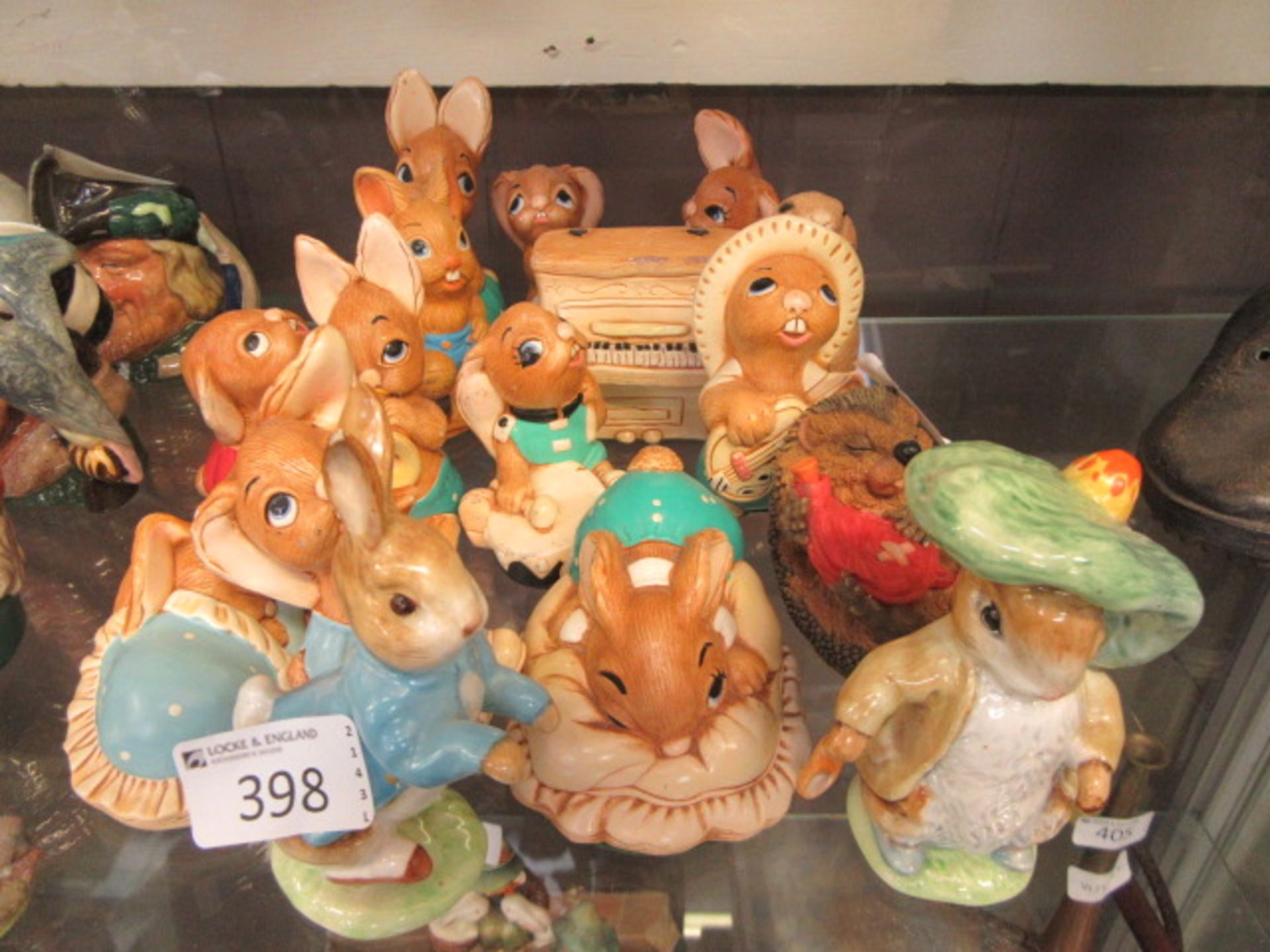 A collection of PenDelfin figures together with two Beswick 'Beatrix Potter' figures to include